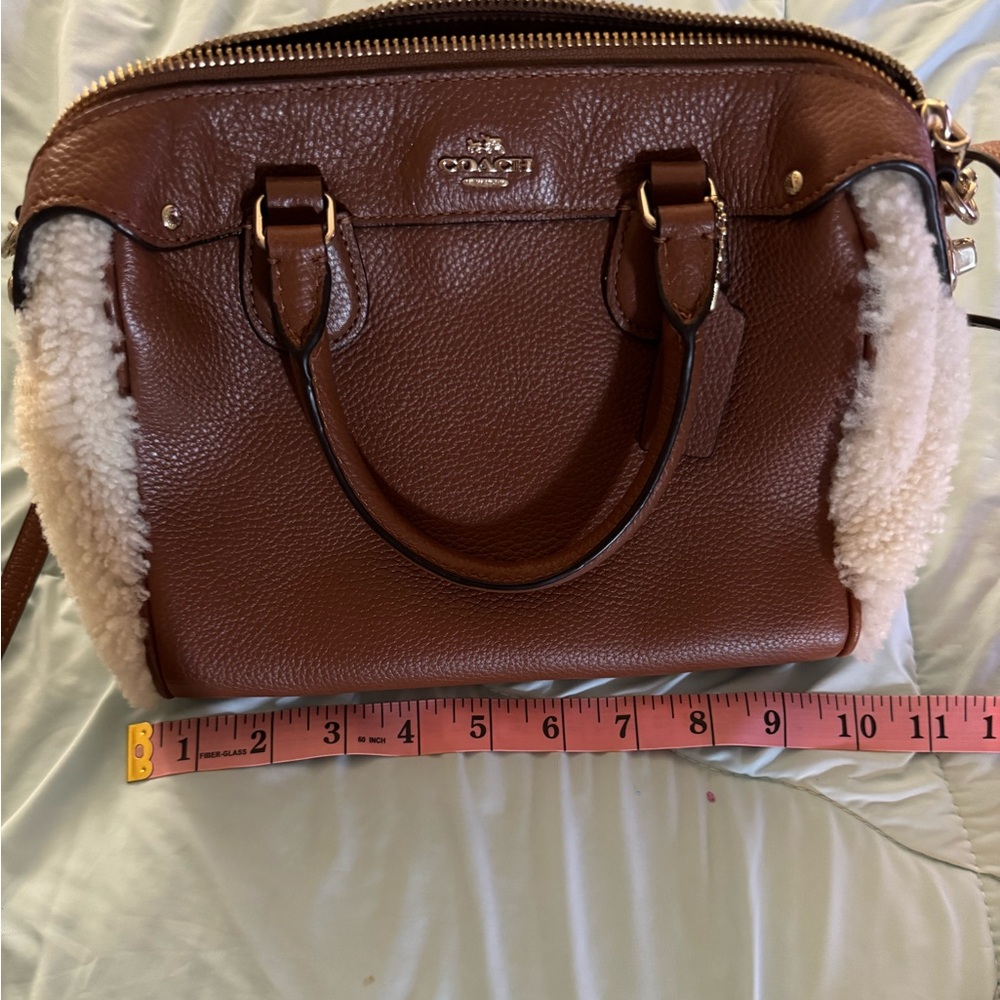 Coach purse Sherpa/Leather used but looks brand new.
